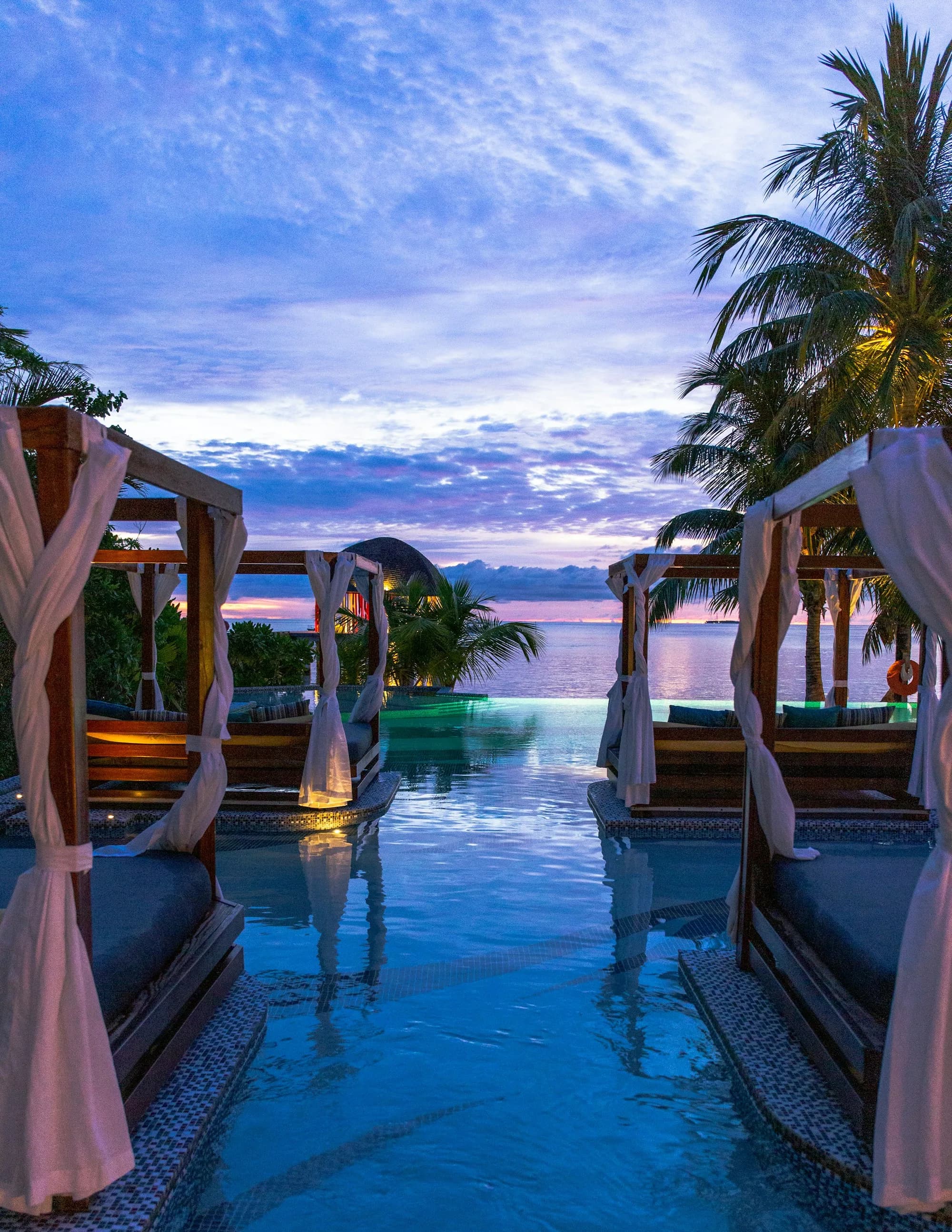 Palm-lined private pool at a Bali villa